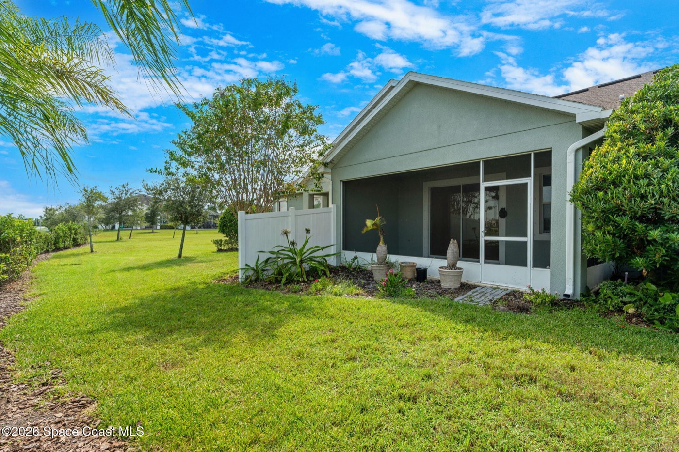 Back of the home and lawn